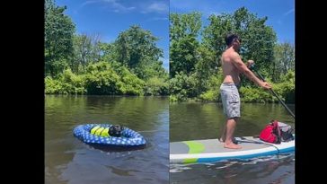 The dog relaxes in a float while its man is canoeing